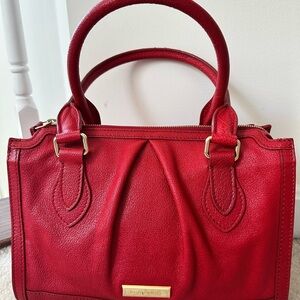 Burberry Red Leather with Gold Hardware.